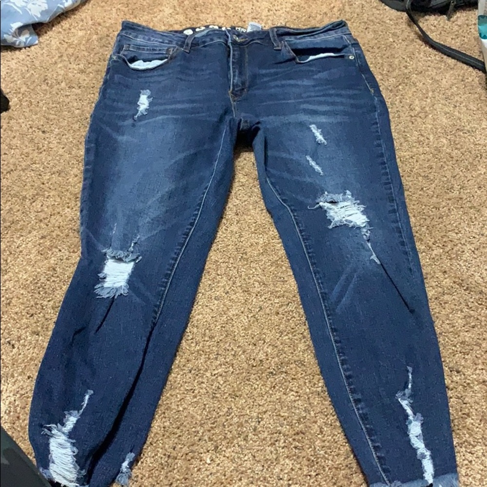 Distressed skinny ankle jeans